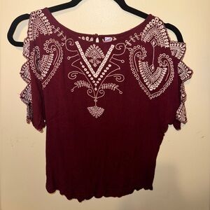 Alya brand short-sleeve embroidered maroon top featuring cut-out shoulders